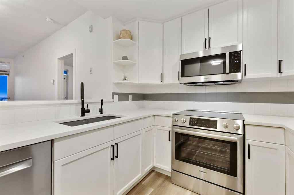 MLS® A2191744 - Unit #708 1718 14 Avenue NW in Hounsfield Heights/Briar Hill Calgary, Residential