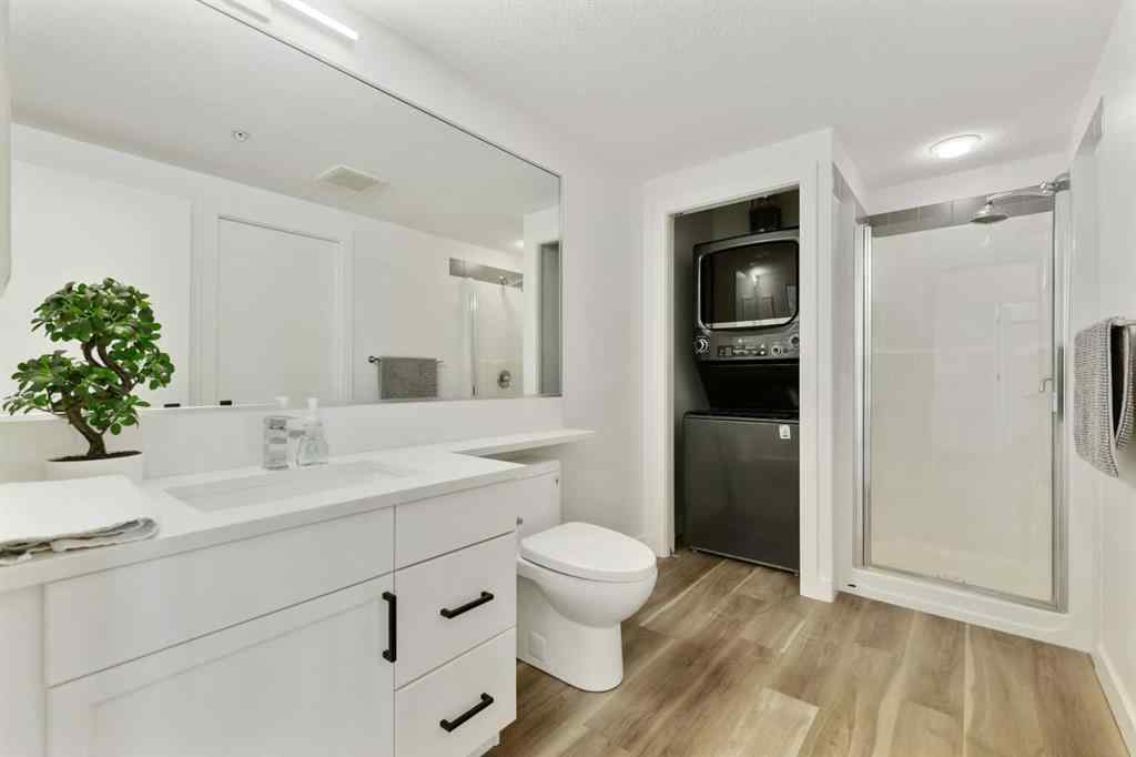 MLS® A2191744 - Unit #708 1718 14 Avenue NW in Hounsfield Heights/Briar Hill Calgary, Residential