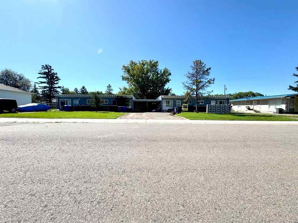 MLS® A2192048 - 227 53 Avenue E in NONE Claresholm, Multi-Family