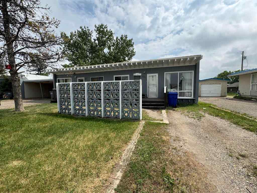 MLS® A2192048 - 227 53 Avenue E in NONE Claresholm, Multi-Family