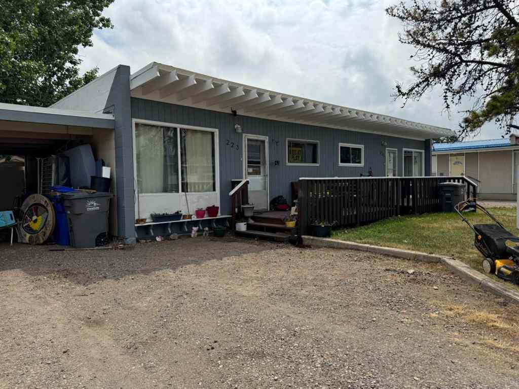 MLS® A2192048 - 227 53 Avenue E in NONE Claresholm, Multi-Family