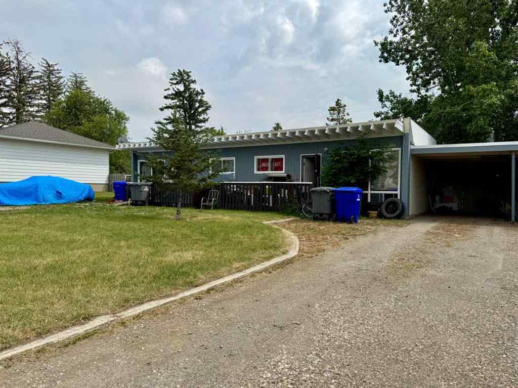 MLS® A2192048 - 227 53 Avenue E in NONE Claresholm, Multi-Family