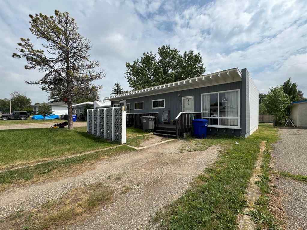 MLS® A2192048 - 227 53 Avenue E in NONE Claresholm, Multi-Family