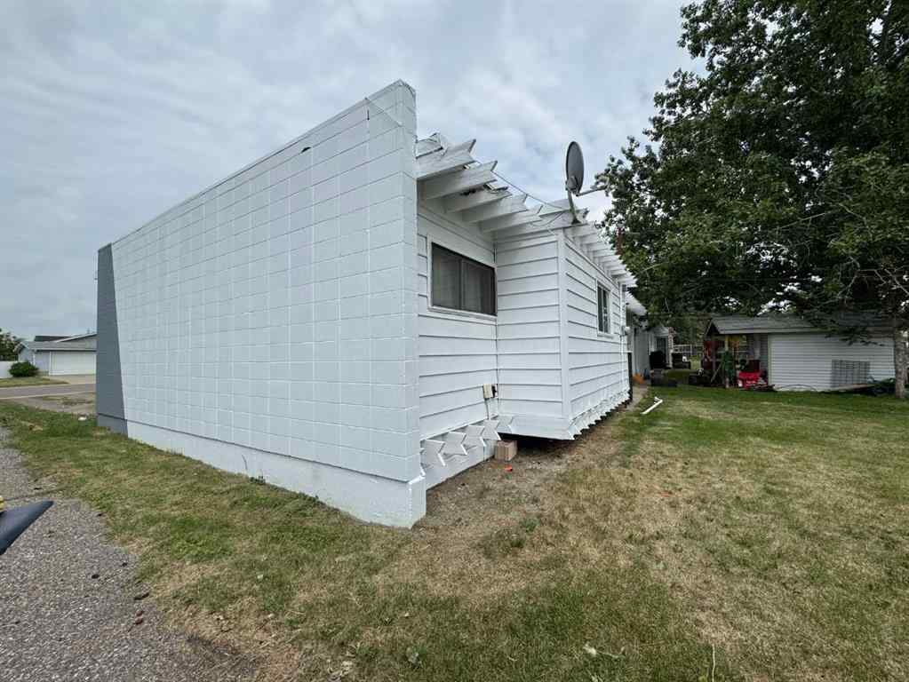 MLS® A2192048 - 227 53 Avenue E in NONE Claresholm, Multi-Family