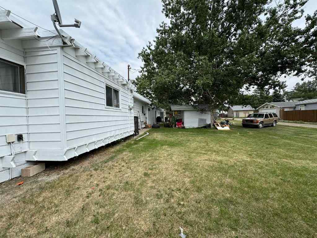 MLS® A2192048 - 227 53 Avenue E in NONE Claresholm, Multi-Family