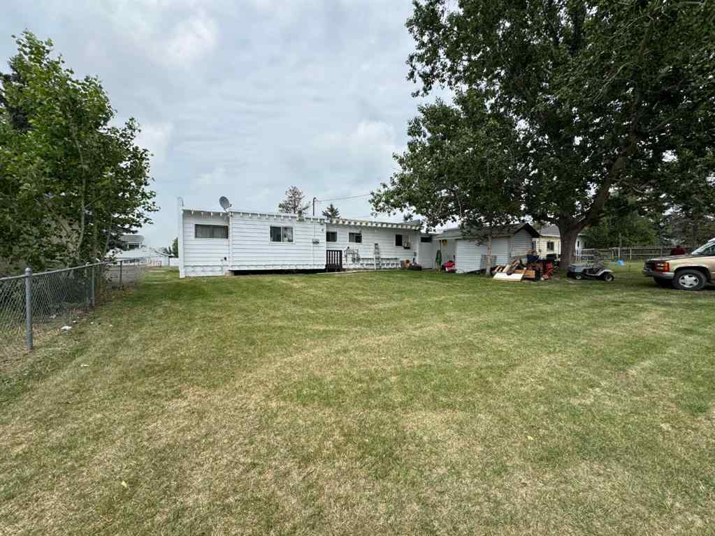 MLS® A2192048 - 227 53 Avenue E in NONE Claresholm, Multi-Family