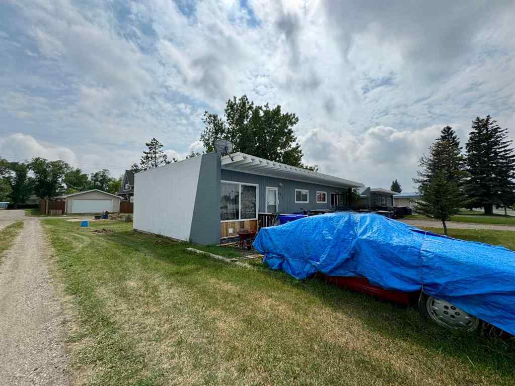 MLS® A2192048 - 227 53 Avenue E in NONE Claresholm, Multi-Family