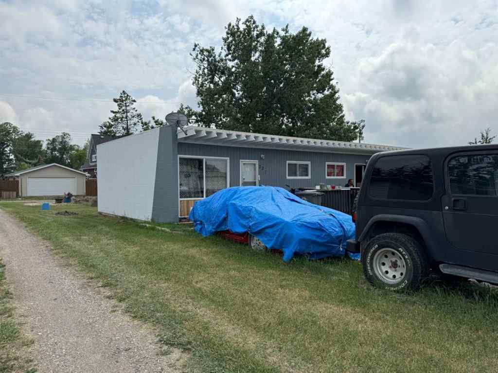 MLS® A2192048 - 227 53 Avenue E in NONE Claresholm, Multi-Family