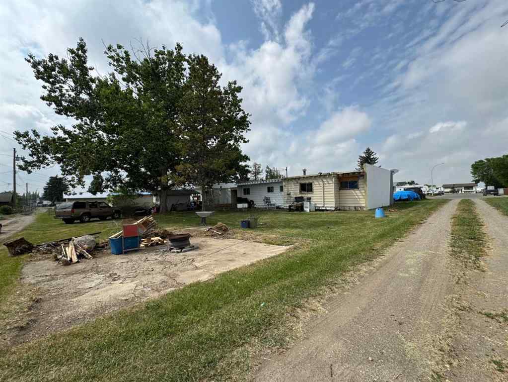 MLS® A2192048 - 227 53 Avenue E in NONE Claresholm, Multi-Family