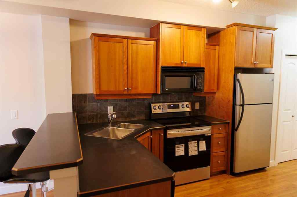 MLS® A2193597 - Unit #206 323 18 Avenue SW in Mission Calgary, Residential