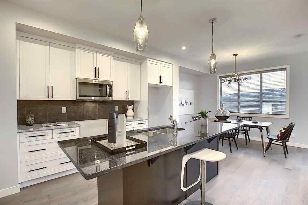 MLS® A2193822 - 322 Sundown Road  in Sunset Ridge Cochrane, Residential