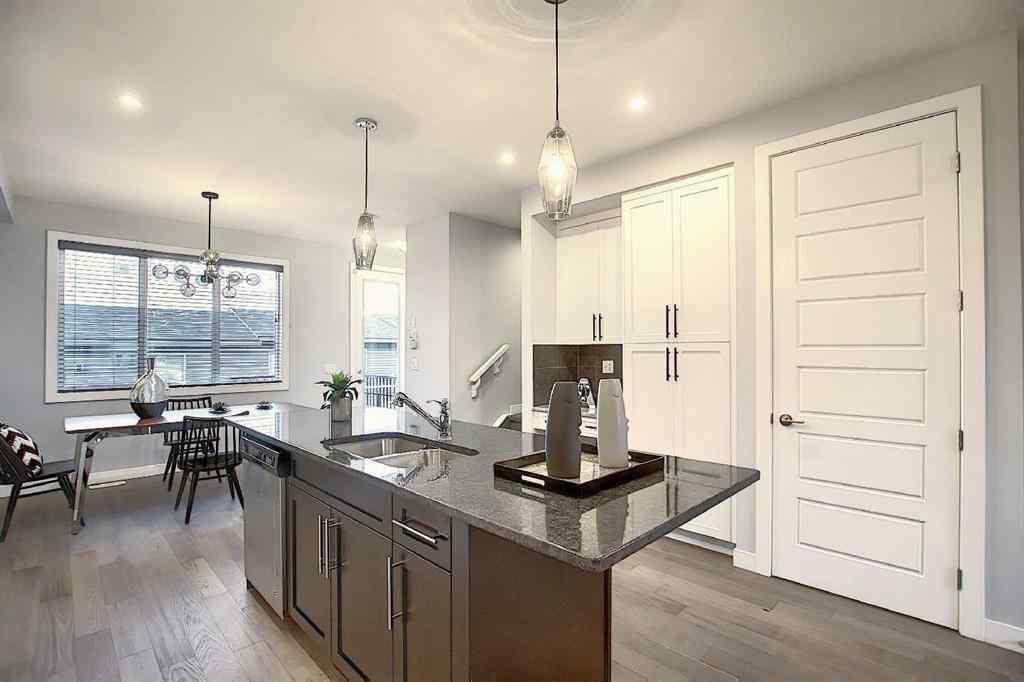 MLS® A2193822 - 322 Sundown Road  in Sunset Ridge Cochrane, Residential