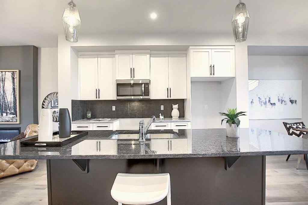 MLS® A2193822 - 322 Sundown Road  in Sunset Ridge Cochrane, Residential