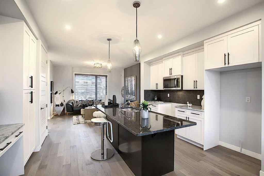 MLS® A2193822 - 322 Sundown Road  in Sunset Ridge Cochrane, Residential