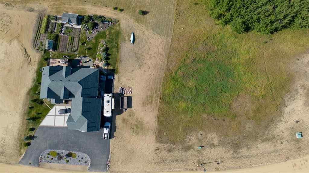 MLS® A2194610 - 414 Sand Hills Drive  in Wolf Creek Village Rural Ponoka County, Land