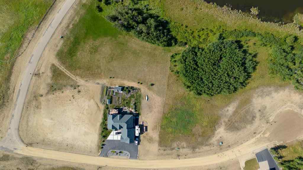 MLS® A2194610 - 414 Sand Hills Drive  in Wolf Creek Village Rural Ponoka County, Land