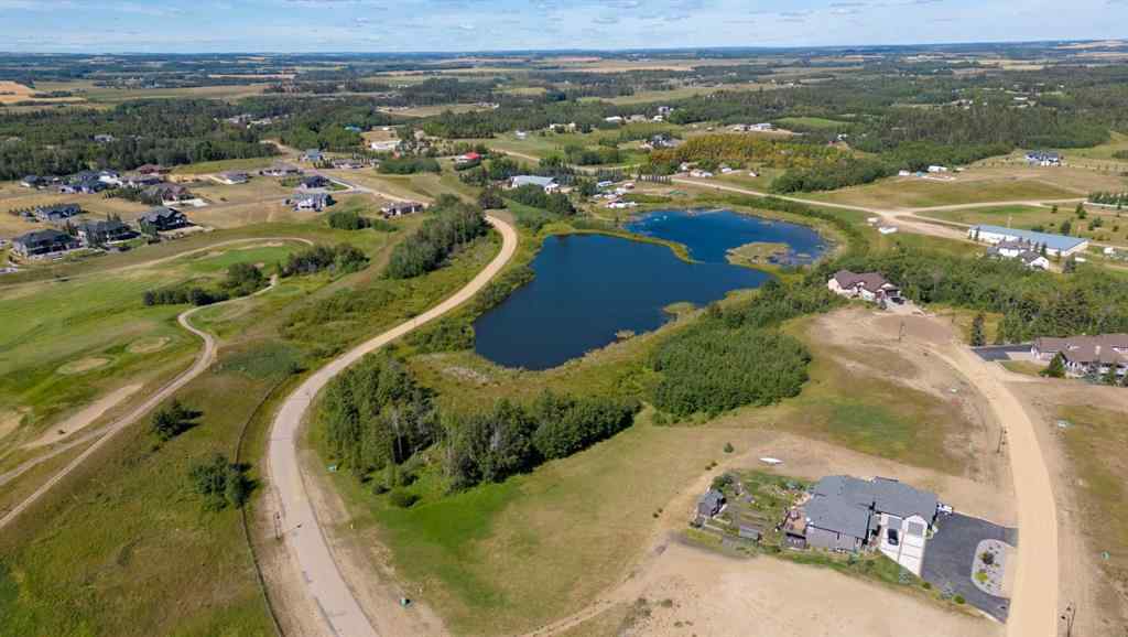 MLS® A2194610 - 414 Sand Hills Drive  in Wolf Creek Village Rural Ponoka County, Land