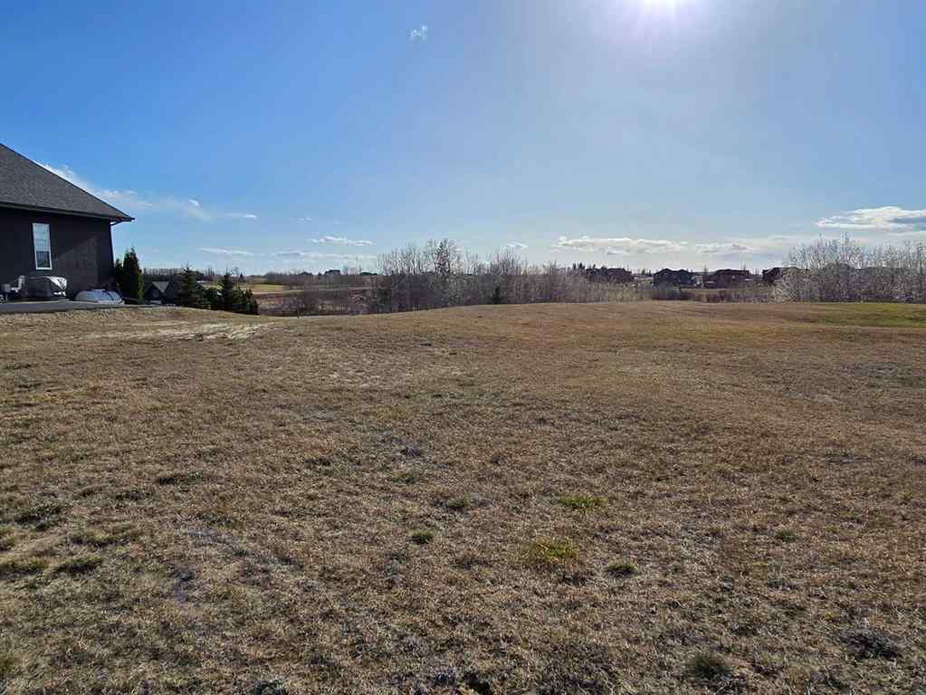 MLS® A2194610 - 414 Sand Hills Drive  in Wolf Creek Village Rural Ponoka County, Land