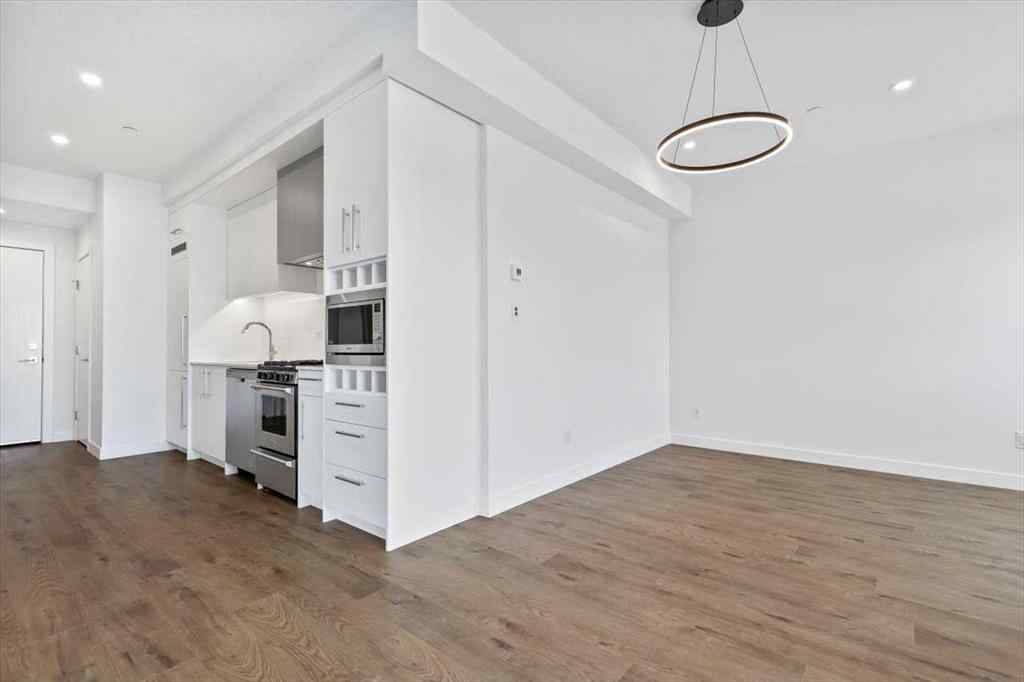 MLS® A2194937 - Unit #201 8370 Broadcast Avenue SW in West Springs Calgary, Residential