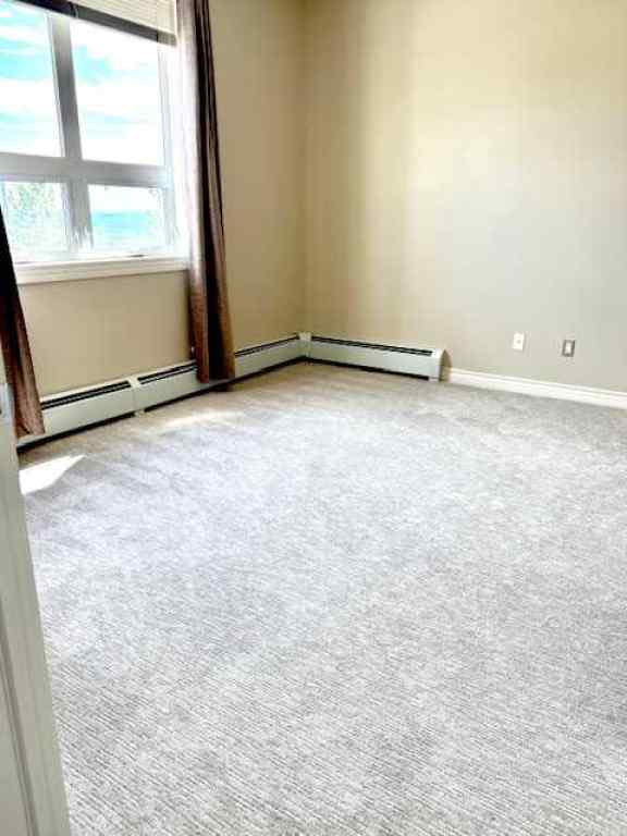 MLS® A2195156 - Unit #202 26 Val Gardena View SW in Springbank Hill Calgary, Residential