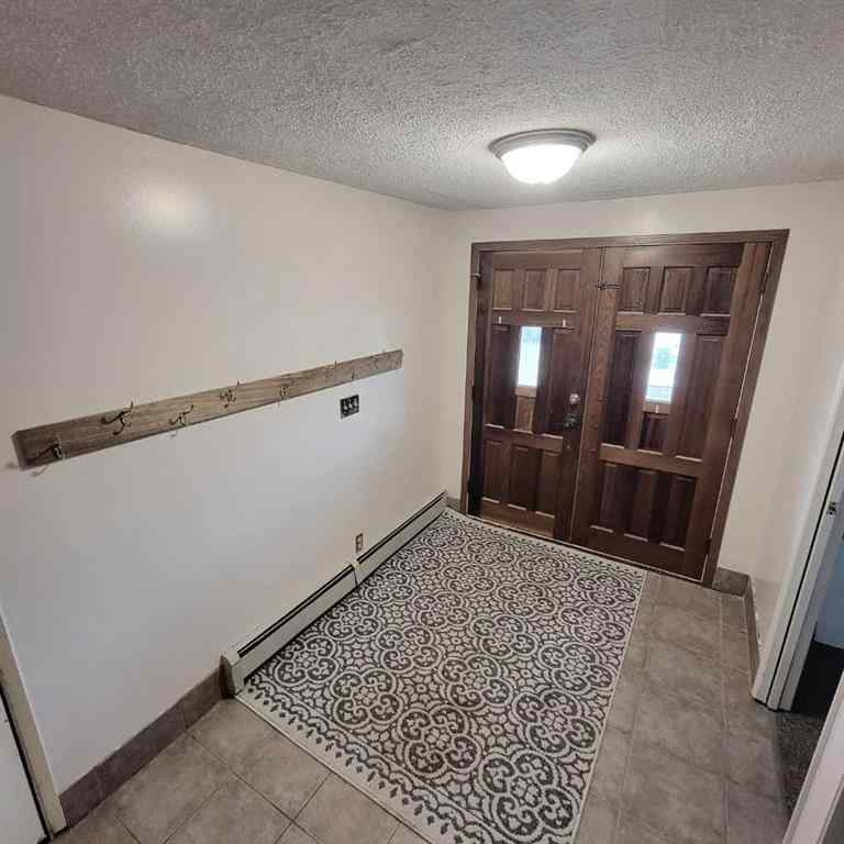 MLS® A2196377 - 11719 103 Street  in South End Peace River, Residential