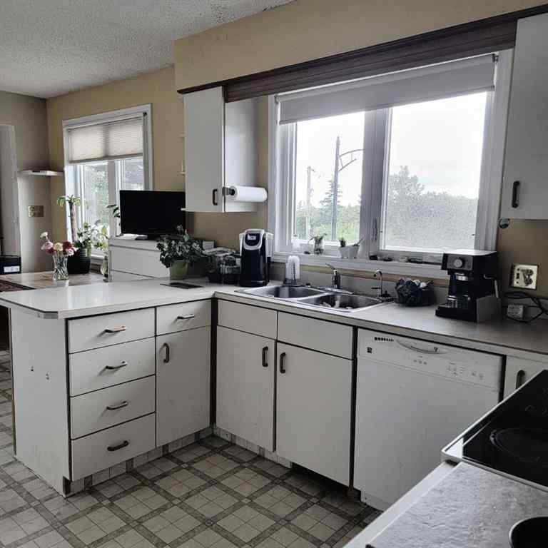 MLS® A2196377 - 11719 103 Street  in South End Peace River, Residential