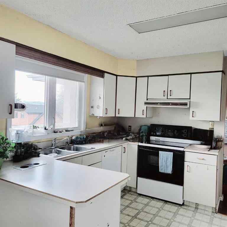 MLS® A2196377 - 11719 103 Street  in South End Peace River, Residential