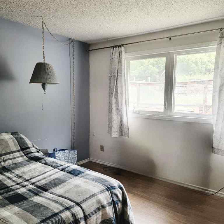 MLS® A2196377 - 11719 103 Street  in South End Peace River, Residential