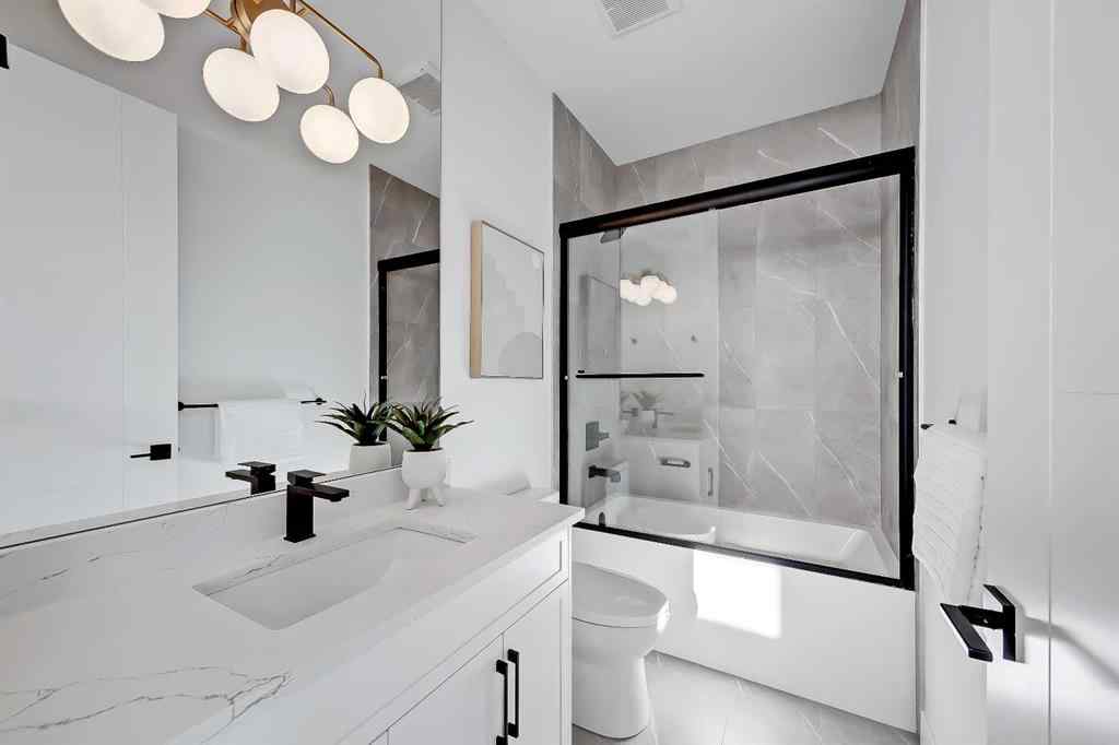 MLS® A2198942 - 215 25 Avenue NW in Tuxedo Park Calgary, Residential