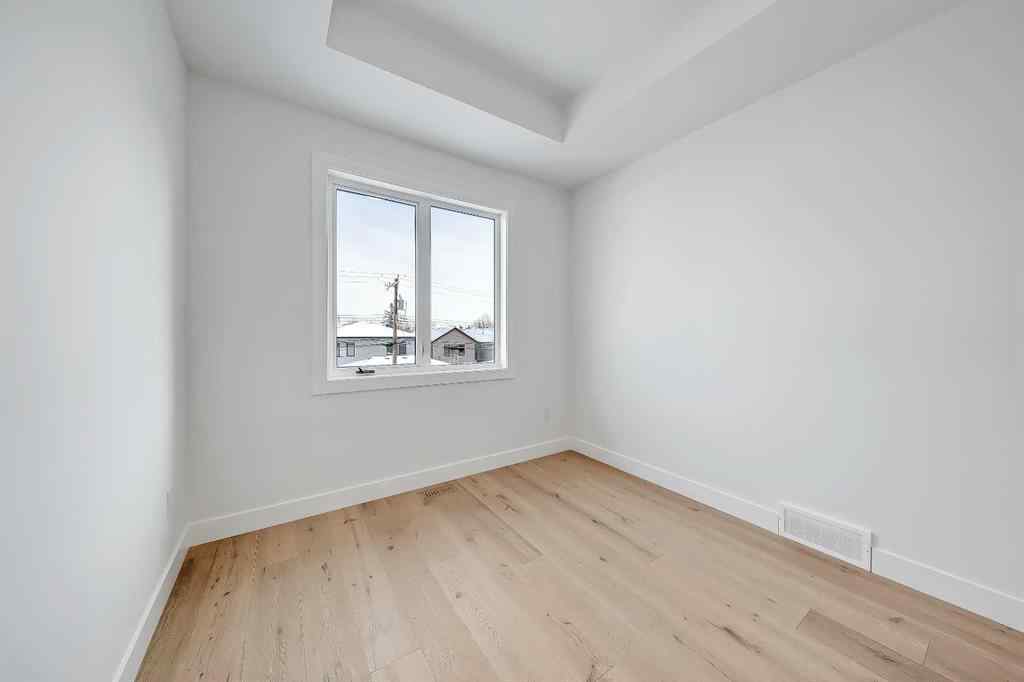 MLS® A2198942 - 215 25 Avenue NW in Tuxedo Park Calgary, Residential