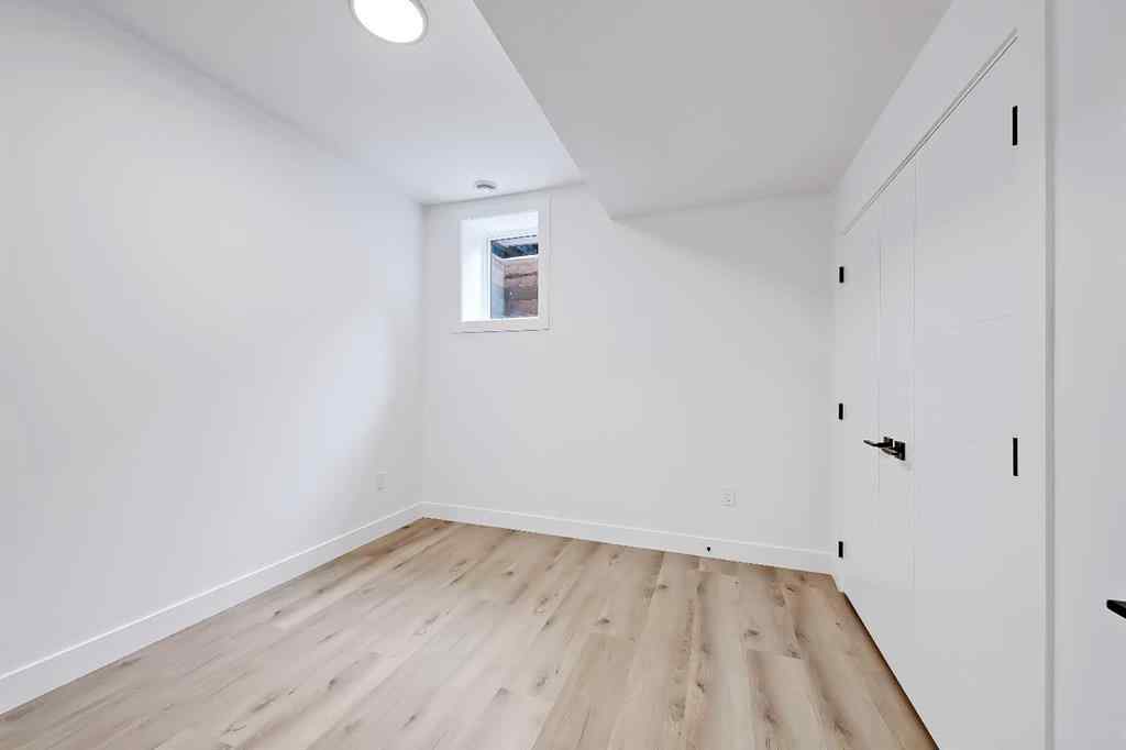 MLS® A2198942 - 215 25 Avenue NW in Tuxedo Park Calgary, Residential