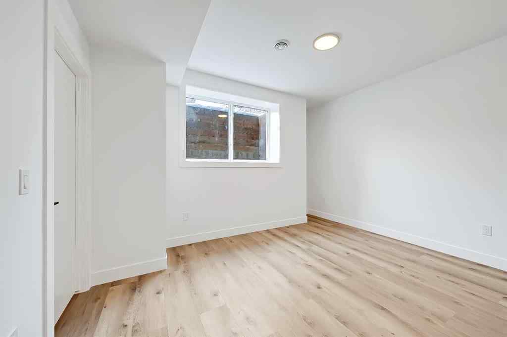 MLS® A2198942 - 215 25 Avenue NW in Tuxedo Park Calgary, Residential