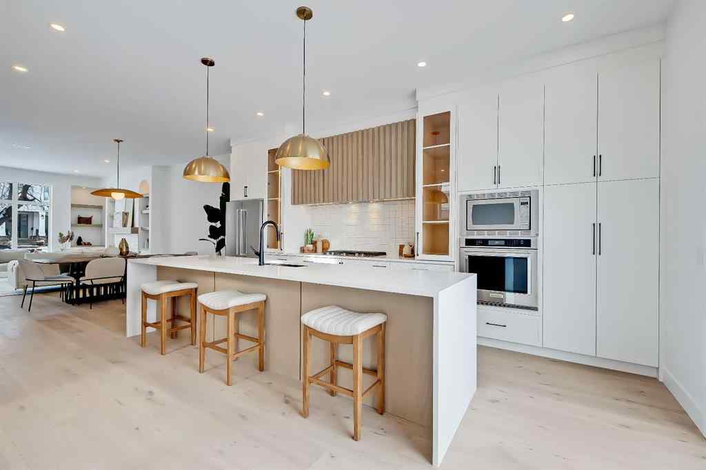 MLS® A2198942 - 215 25 Avenue NW in Tuxedo Park Calgary, Residential