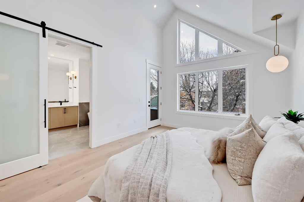 MLS® A2198942 - 215 25 Avenue NW in Tuxedo Park Calgary, Residential