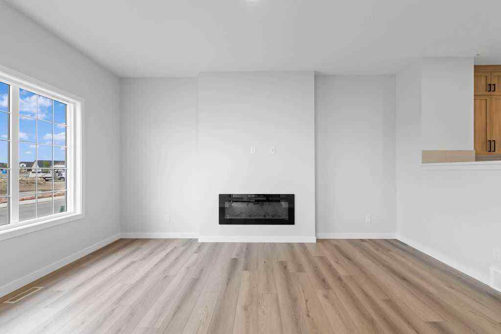 MLS® A2199712 - 1025 Reynolds Crescent SW in Coopers Crossing Airdrie, Residential