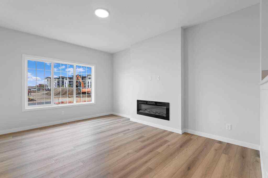 MLS® A2199712 - 1025 Reynolds Crescent SW in Coopers Crossing Airdrie, Residential