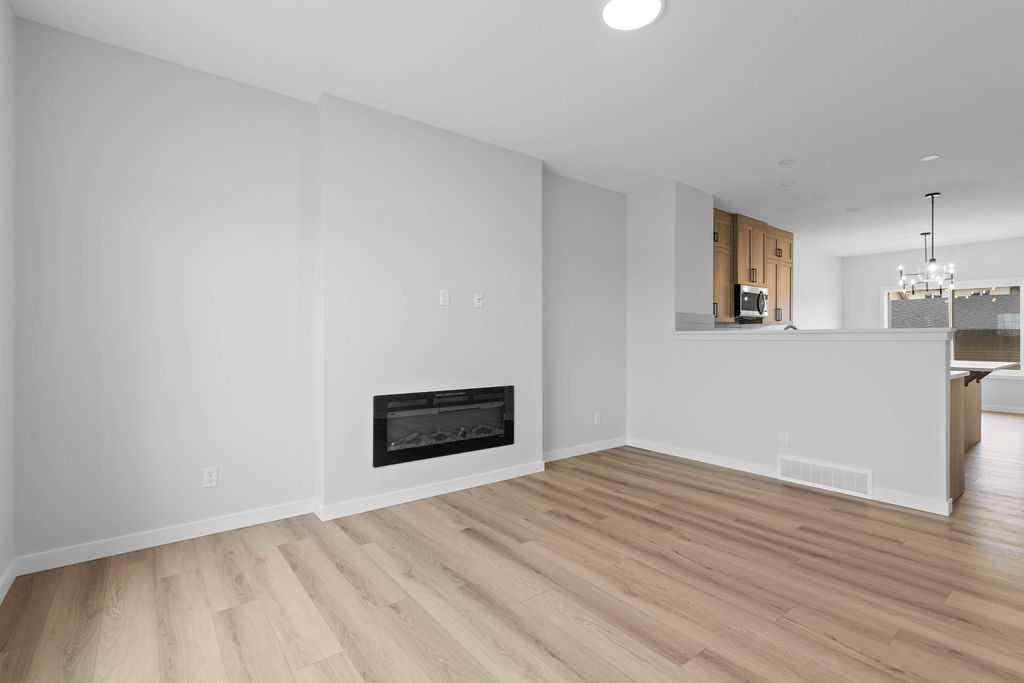 MLS® A2199712 - 1025 Reynolds Crescent SW in Coopers Crossing Airdrie, Residential