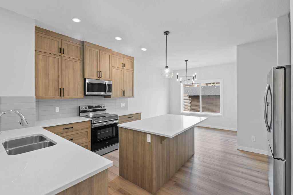 MLS® A2199712 - 1025 Reynolds Crescent SW in Coopers Crossing Airdrie, Residential
