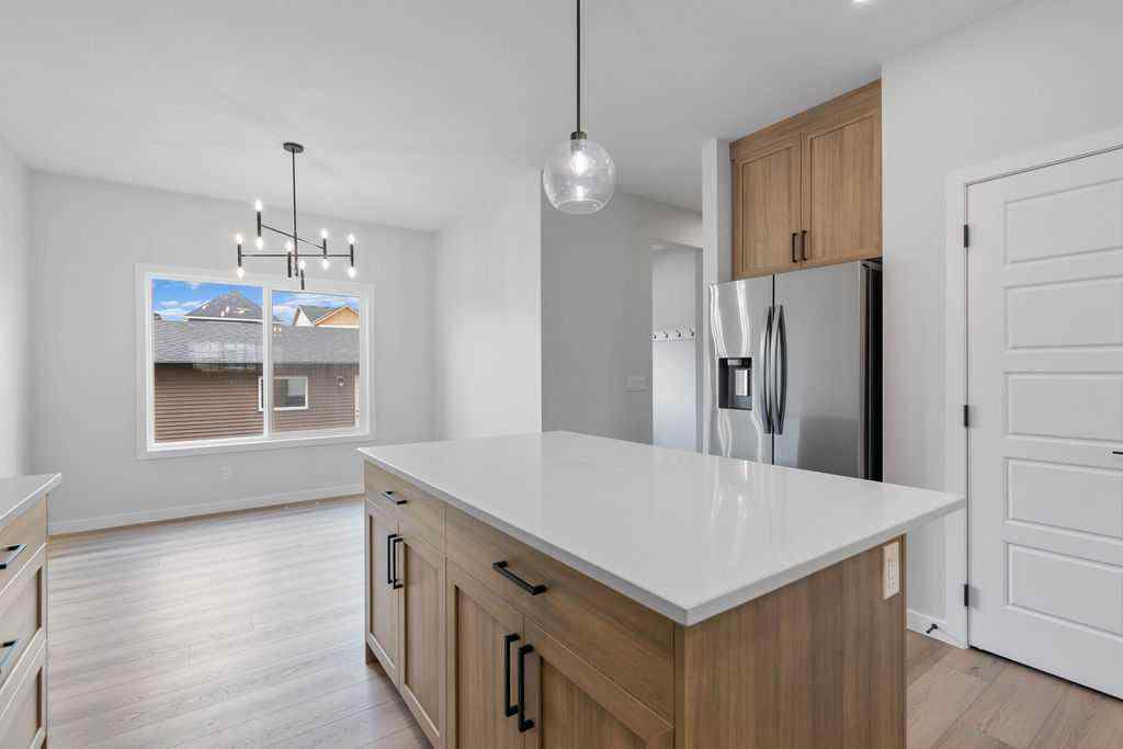 MLS® A2199712 - 1025 Reynolds Crescent SW in Coopers Crossing Airdrie, Residential