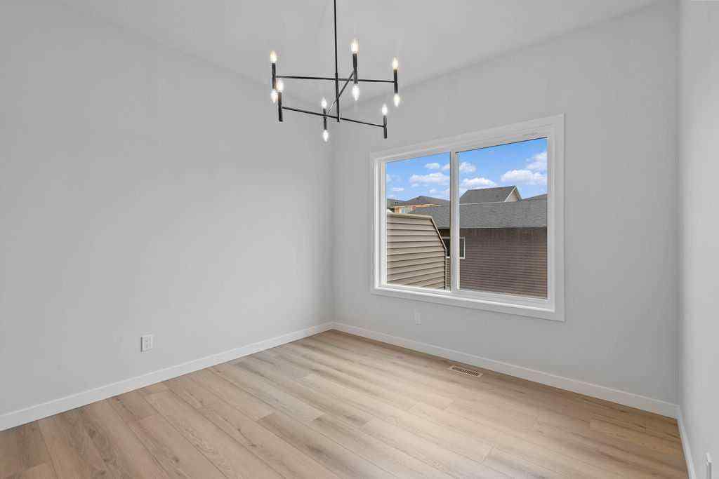 MLS® A2199712 - 1025 Reynolds Crescent SW in Coopers Crossing Airdrie, Residential