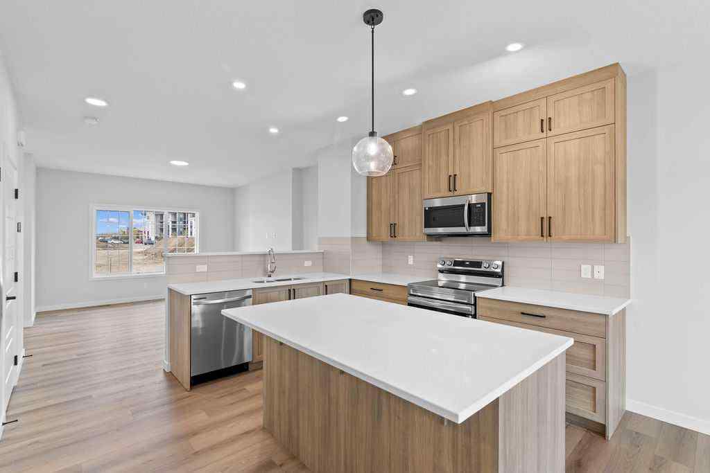 MLS® A2199712 - 1025 Reynolds Crescent SW in Coopers Crossing Airdrie, Residential