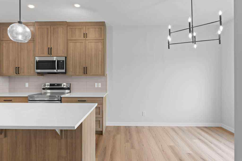MLS® A2199712 - 1025 Reynolds Crescent SW in Coopers Crossing Airdrie, Residential