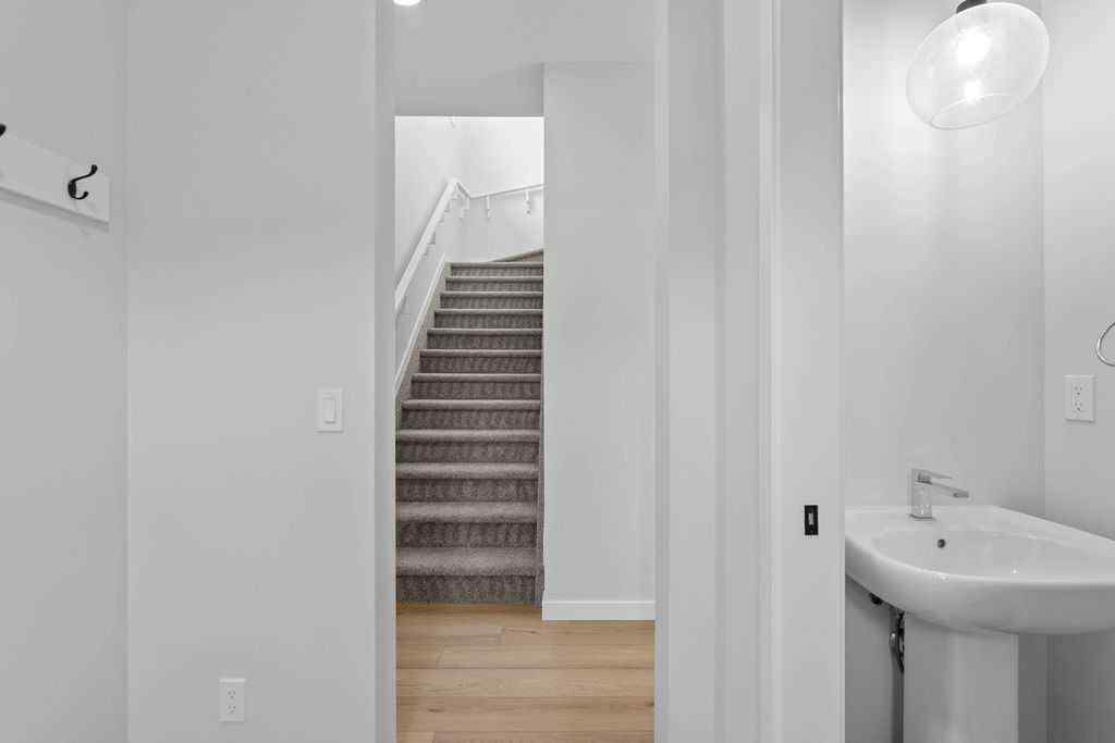 MLS® A2199712 - 1025 Reynolds Crescent SW in Coopers Crossing Airdrie, Residential