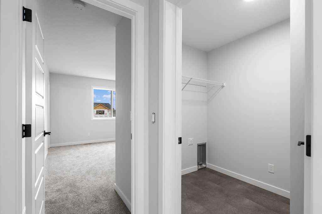 MLS® A2199712 - 1025 Reynolds Crescent SW in Coopers Crossing Airdrie, Residential