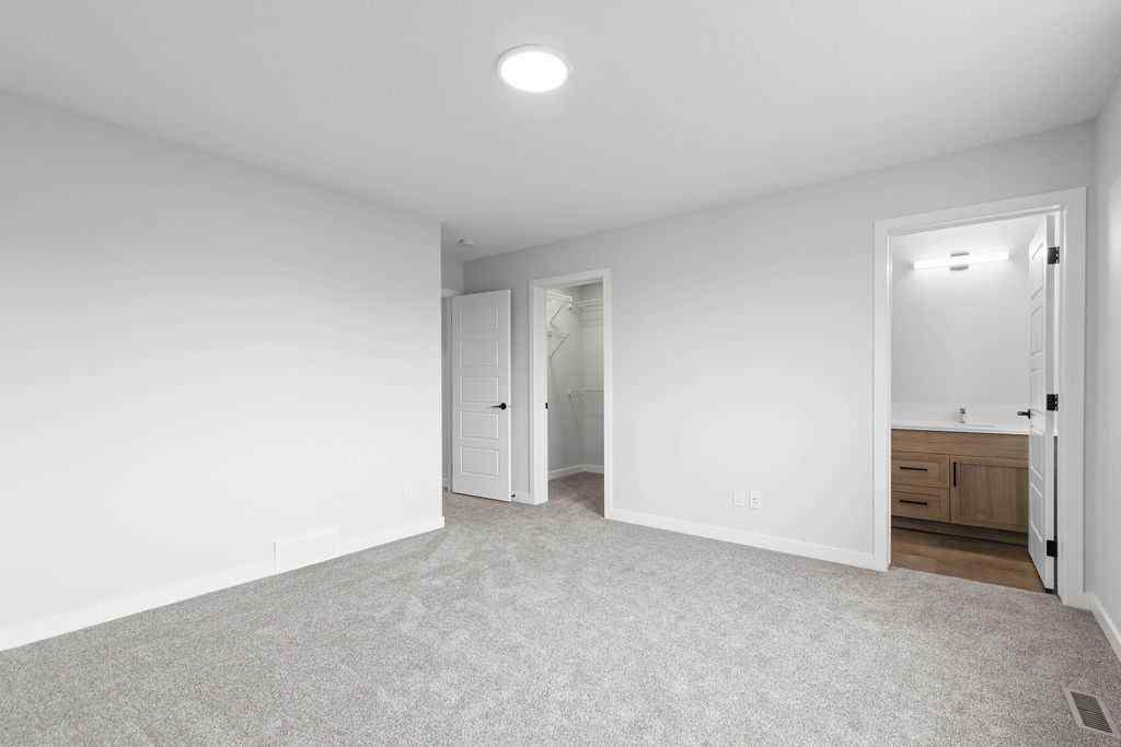 MLS® A2199712 - 1025 Reynolds Crescent SW in Coopers Crossing Airdrie, Residential