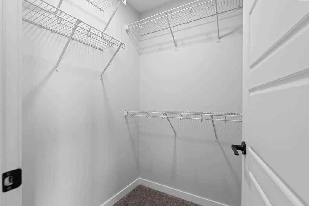 MLS® A2199712 - 1025 Reynolds Crescent SW in Coopers Crossing Airdrie, Residential
