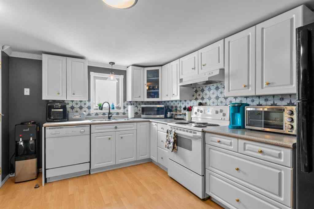 MLS® A2199828 - 31542 HWY 2A   in NONE Rural Mountain View County, Residential
