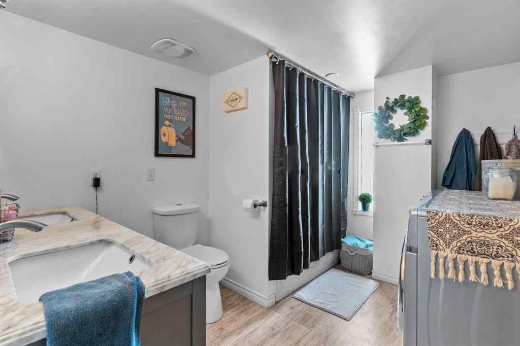 MLS® A2199828 - 31542 HWY 2A   in NONE Rural Mountain View County, Residential