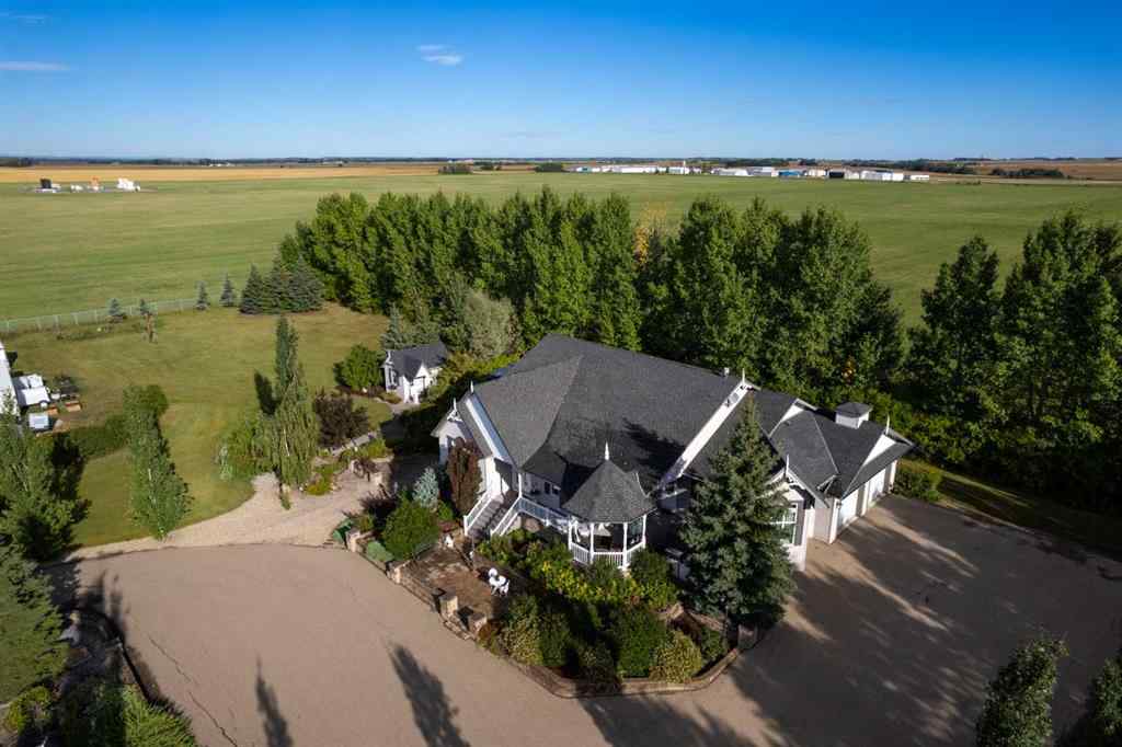 MLS® A2199828 - 31542 HWY 2A   in NONE Rural Mountain View County, Residential