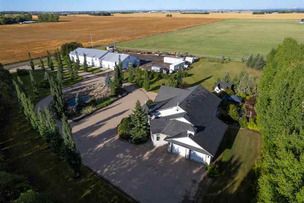 MLS® A2199828 - 31542 HWY 2A   in NONE Rural Mountain View County, Residential